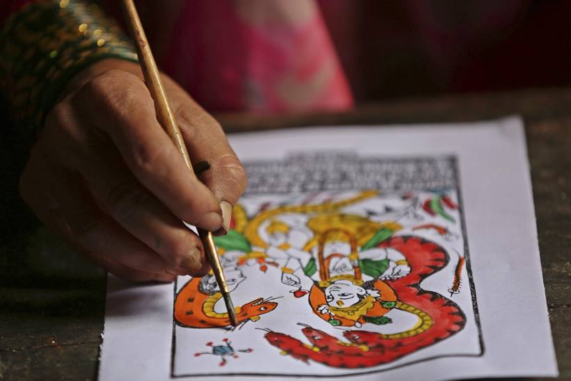 nepal chitrakaar families, nepal art, chitrakar couple, nepal chitrakar art, world news, indian express
