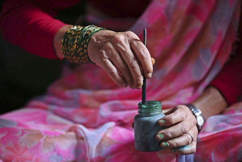 nepal chitrakaar families, nepal art, chitrakar couple, nepal chitrakar art, world news, indian express