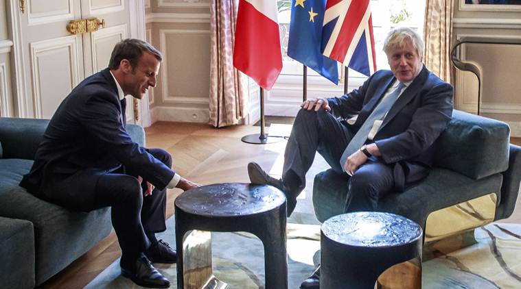 boris johnson, emmanuel macron, boris johnson foot up, boris johnson puts feet up, boris johnson emmanuel macron, emmanuel macron boris johnson, world news, Indian Express