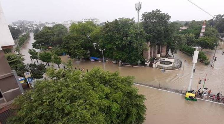 Kirti tower/Amar cars circle in Sayajigunj right after the Kala Ghoda bridge. The water is from the overflowing Vishwamitri river (Express Photo)