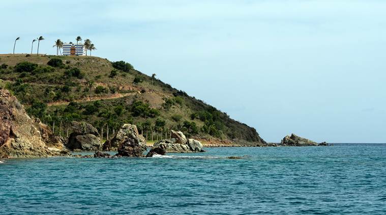 Jeffrey Epstein’s isle, where cash bought clout
