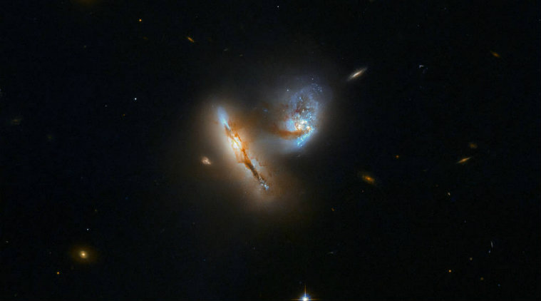 WOW! See two galaxies colliding, as seen by NASA's Hubble ...