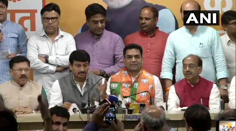 Kapil mishra, aap mla, Kapil mishra joins bjp, kapil mishra former aap minister, aap vs bjp, indian express