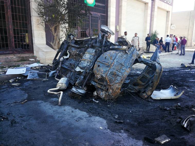libya car blast, libya car bomb blast, benghazi car blast, benghazi car bomb blast, libya blast, benghazi blast, world news, Indian Express
