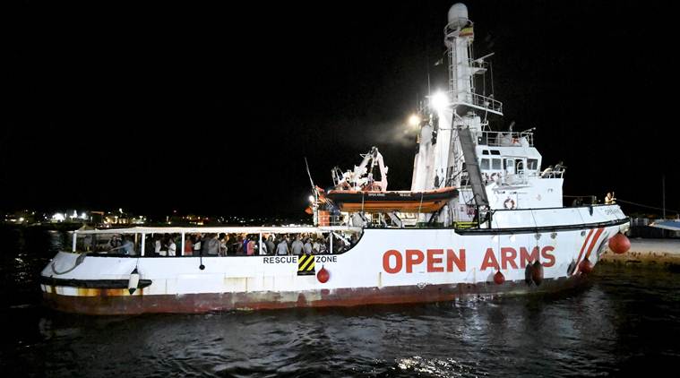 Migrants exit rescue ship in Italy after 19-day standoff | World News ...