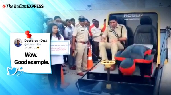 road safety rules, up traffic police, what happens when not wearing seat belt, seat belt persuader, up police road safety demonstration, good news, indian express