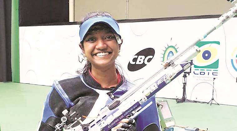 World Cup gold around her neck and golden earing waiting at home