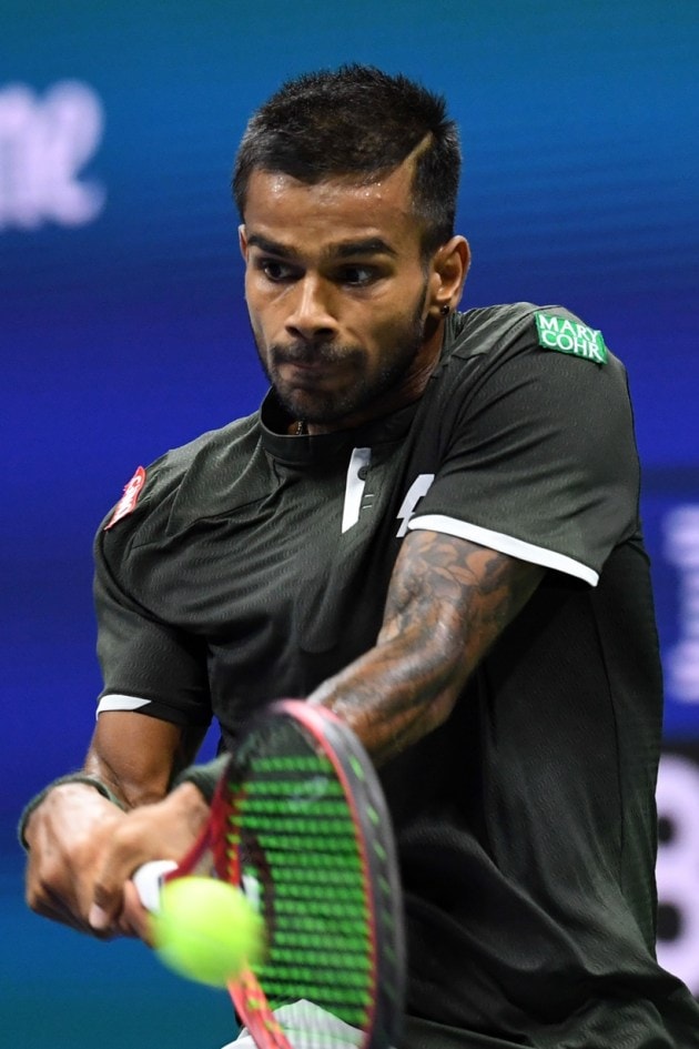 sumit nagal, sumit nagal vs roger federer, sumit nagal vs roger federer us open, sumit nagal photos, sumit nagal vs federer photos, us open, tennis news