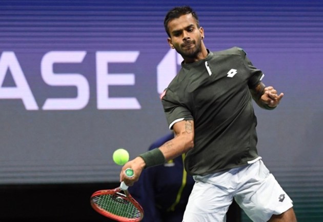 sumit nagal, sumit nagal vs roger federer, sumit nagal vs roger federer us open, sumit nagal photos, sumit nagal vs federer photos, us open, tennis news