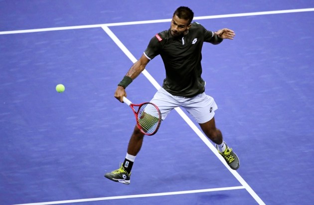 sumit nagal, sumit nagal vs roger federer, sumit nagal vs roger federer us open, sumit nagal photos, sumit nagal vs federer photos, us open, tennis news
