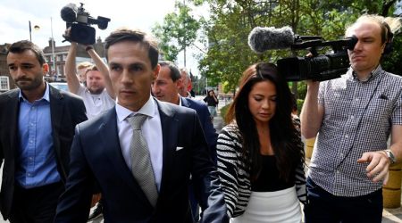 Denmark's Thorbjorn Olesen and his companion leave the Uxbridge magistrates court in Uxbridge, Britain August 21, 2019. REUTERS/Toby Melville