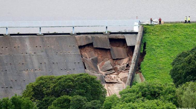 Northwest England town evacuation, Derbyshire Dam wall holding, England heavy rainfall, Europe heatwave, world news