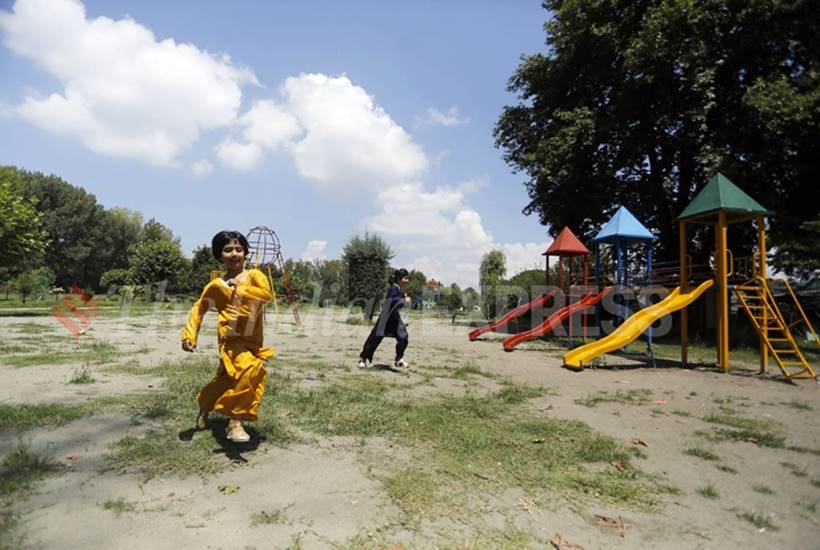 Kashmir Eid celebrations, Kashmir curfew Eid, Jammu Kashmir clampdown, Kashmir Eid al Adha, Kashmir security lockdown, Kashmir protests article 370