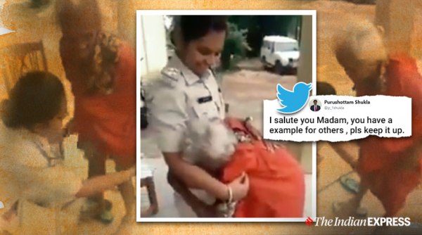mp cop gifts elderly woman clothes slipper, damoh police officer give poor woman clothes slippers, police good news, indian express, viral videos