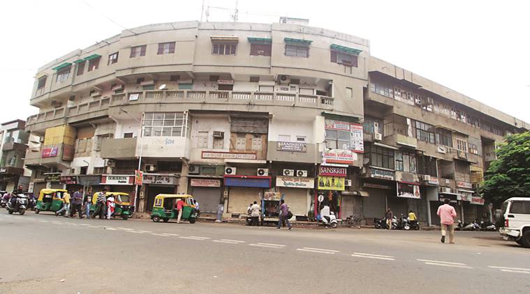 Ahmedabad textile industry bandh, Ahmedabad bandh, Ahmedabad businessman assault, businessman assault in Ahmedabad, Ahmedabad news, City news, Indian Express
