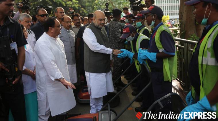 Amit Shah, Amit Shah mops floor, Amit Shah Aiims, Modi birthday, Seva saptah Modi birthday, indian express