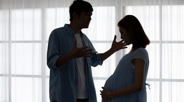pregnant couple, postpartum depression, indian express