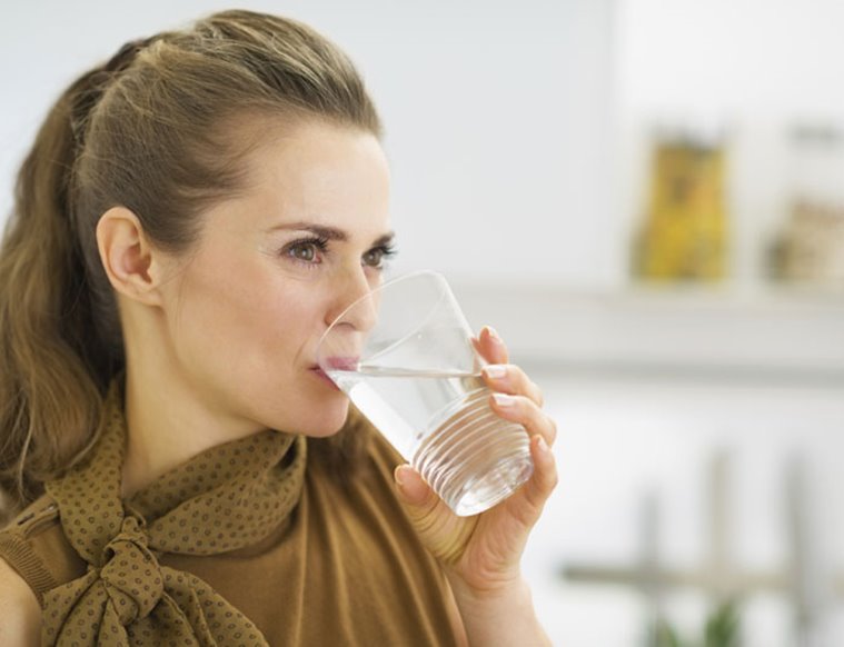 drinking water, importantance of hydration, water consumption during day, indian express