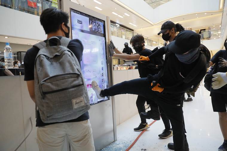 Hong Kong protests, Hong Kong protesters, Hong Kong extradition bill, Hong Kong extradition bill protests, Hong Kong Police, Hong Kong subway station damage, World news, Indian Express