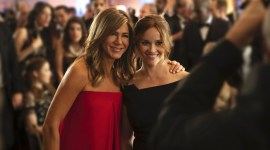 Jennifer Aniston, left, and Reese Witherspoon appear in a scene from The Morning Show