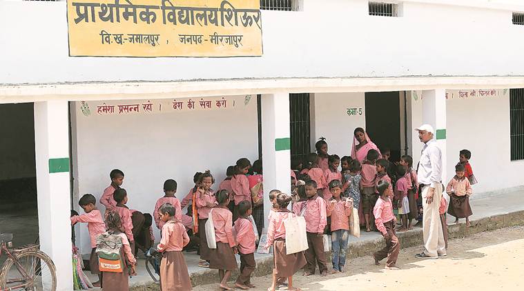 mid day meal, mirzapur mid day meal, mirzapur students video, students served roti and salt, pawan jaiswal, substandard mid-day meal, UP police, mid-day meal reporter, indian express