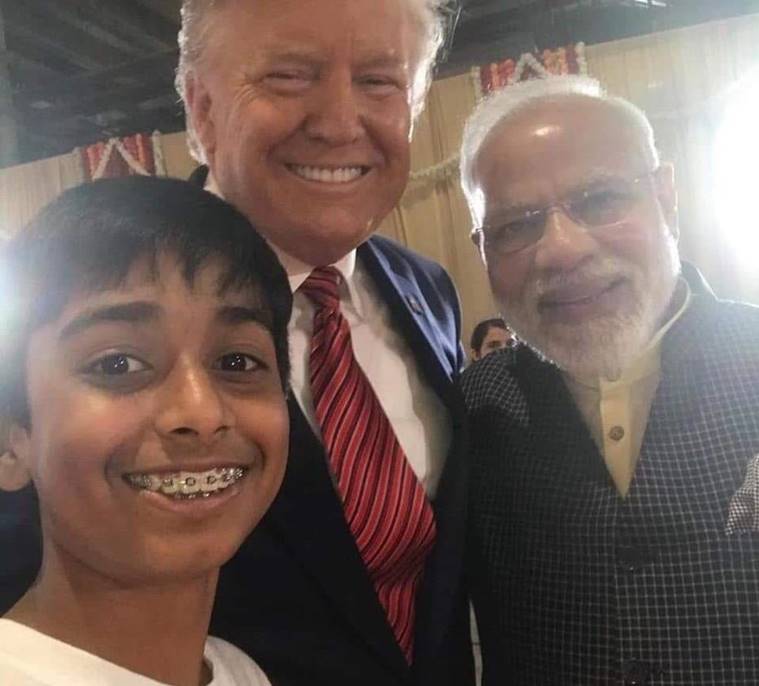 modi trump selfie boy, howdy modi event selfie boy, Satvik hegde, selfie boy, selfie teenager, white dress Indian boy, Karnataka boy, howdy modi houston, Modi Trump meet, Modi speech houston, howdy modi houston trending, boy selfie modi trump, indian express, indian express news
