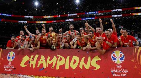 Basketball - FIBA World Cup - Final - Argentina v Spain - Wukesong Sport Arena, Beijing, China - September 15, 2019   Spain's players celebrate with the trophy after winning the FIBA World Cup REUTERS/Kim Kyung-Hoon