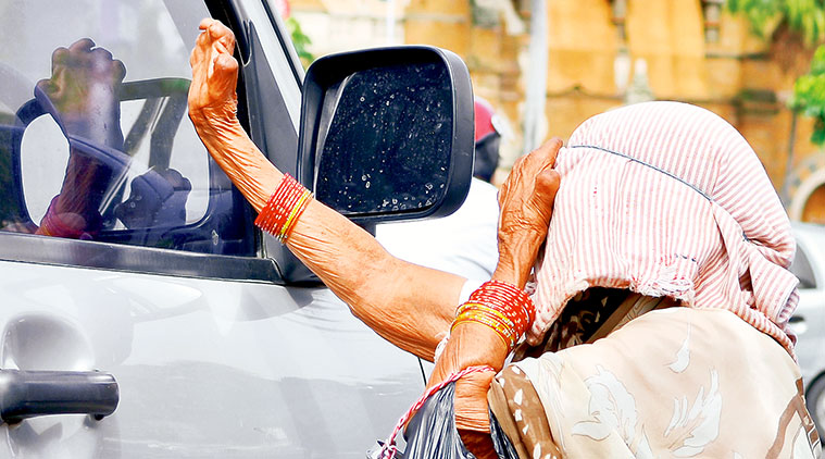 winter, beggars at traffic junctions
