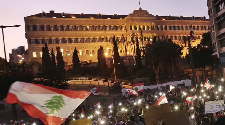 Facing protests, Lebanon approves emergency economic reforms