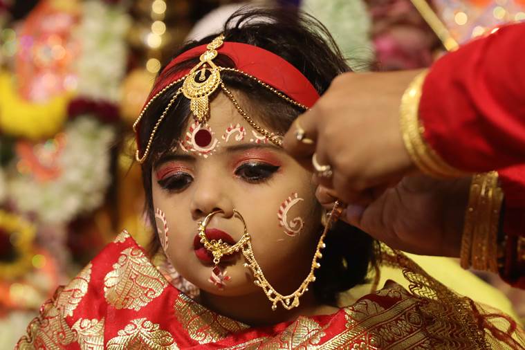 Bengal family worships four-year-old Muslim girl during the Kumari Puja ritual of Durga Puja festival, Durga Puja 2019, Kumari Puja, Navratri, Trending, Indian Express news