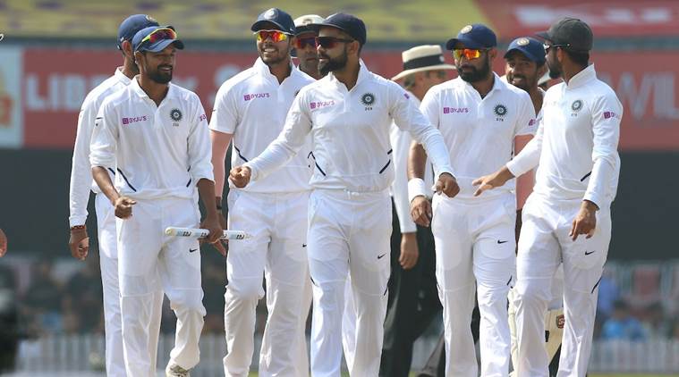 Virat Kohli (centre) leads the team off the ground after winning the Test at Ranchi