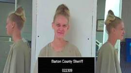 Girlfriend of Kansas man who wounded two lawmen enters plea