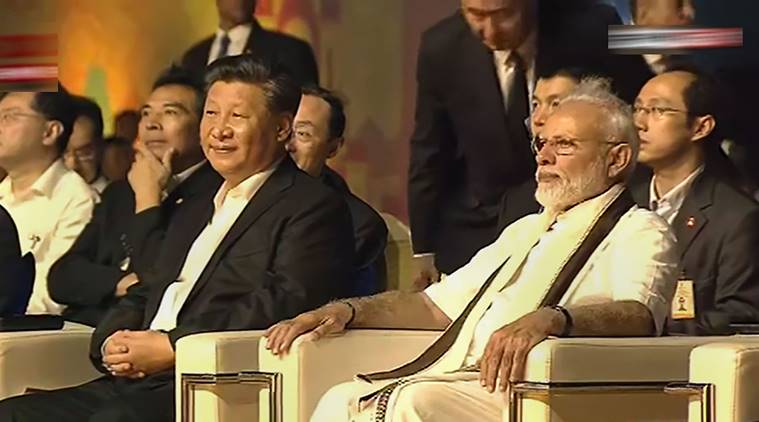 PM Modi and Chinese President Xi Jinping attending a cultural programme at Shore Temple in Mahabalipuram. (PTI)