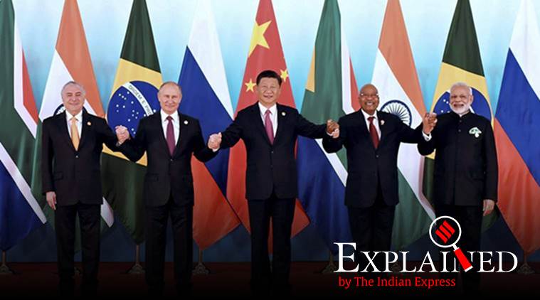 In this photo released by Xinhua News Agency, BRICS leaders from left, Brazilian President Michel Temer, Russian President Vladimir Putin, Chinese President Xi Jinping, South African President Jacob Zuma, and Indian Prime Minister Narendra Modi pose for a group photo at the BRICS Summit in Xiamen in southeastern China's Fujian Province, Monday, Sept. 4, 2017. (Zhang Duo/Xinhua via AP)