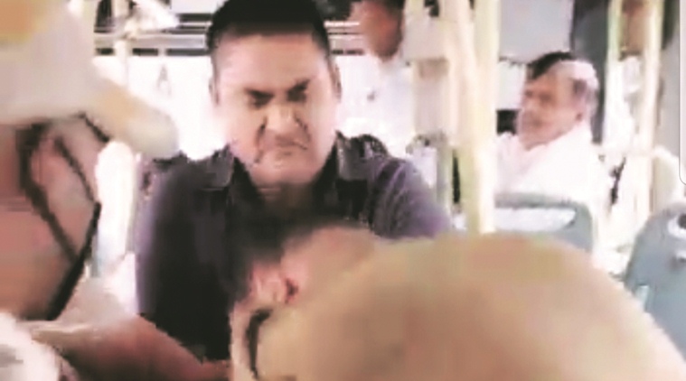 Delhi city news, Delhi DTC marshal, Delhi bus marshal beaten, delhi bus conductor beaten
