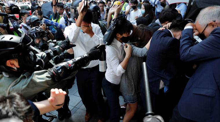 Hong Kong police officer shoots protester as violence flares