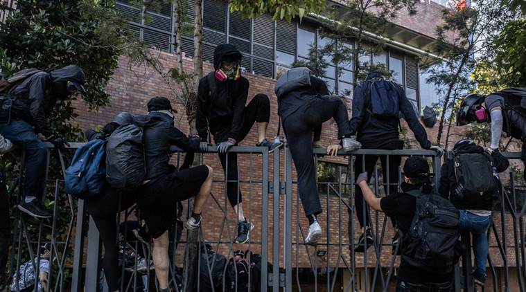 Hong Kong protests: Demonstrators trapped at Polytechnic University as court overturns mask ban