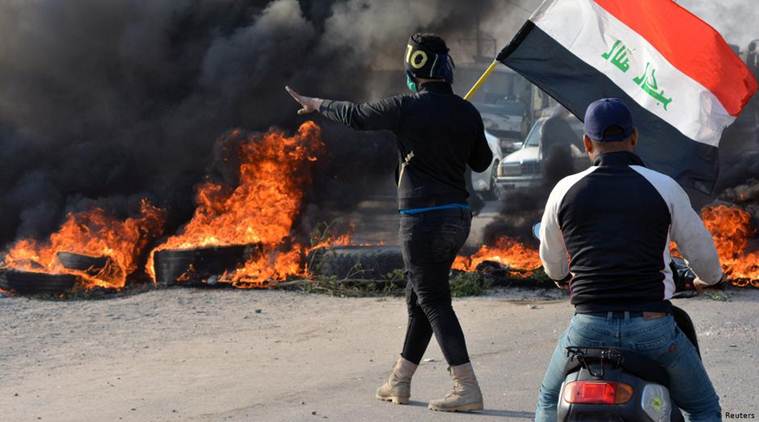 Iraqi forces kill 13 protesters, deploy military to stem unrest