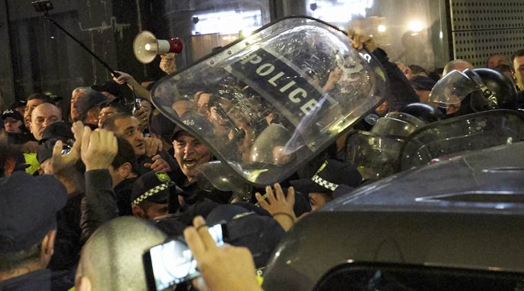 Tens of thousands gather in tbilisi to demand snap elections in georgia