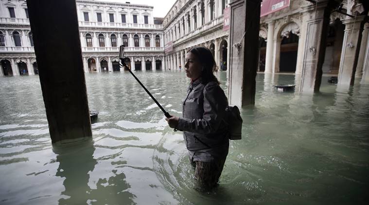 Venice hit by another ferocious high tide, flooding city | World News ...