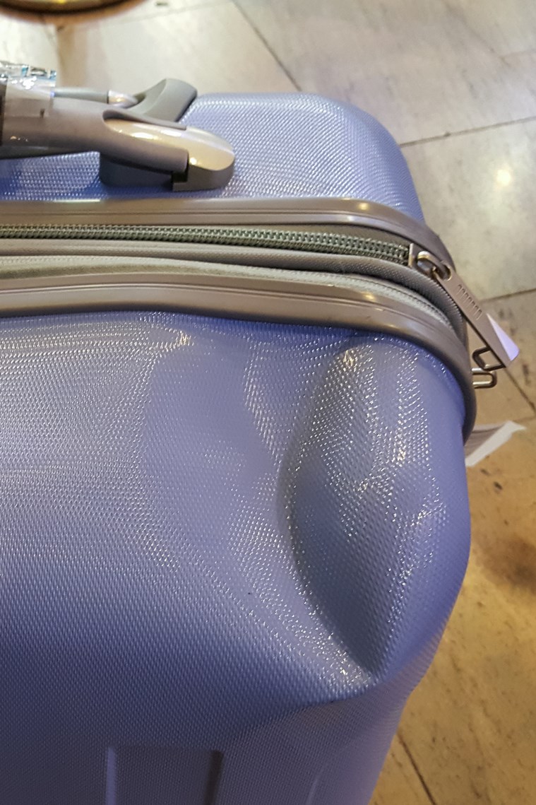 alitalia damaged baggage