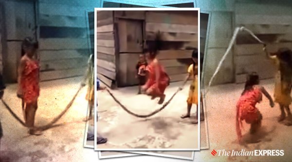 snake video, kids playing with dead snake, children skipping with dead snake, viral videos, indian express