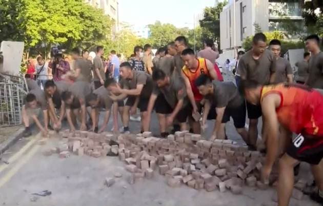 Hong Kong protests, Hong Kong university cleanup, Hong Kong university protests, Hong Kong extradition bill protests, Hong Kong anti-government protests, World news, Indian Express
