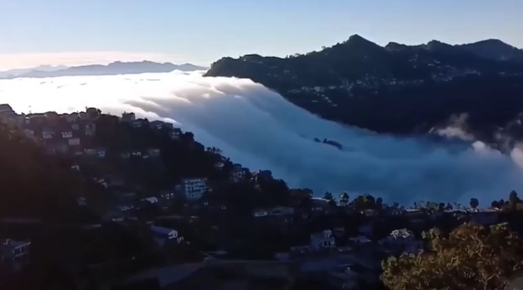 clouds, waterfall clouds, clouds float like waterfall, mizoram waterfall clouds, viral news, viral videos, indian express