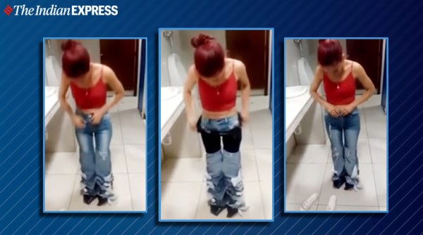 woman shoplifter, woman shoplifter wears jeans, 8 jeans, viral video, venezuela, venezuela theft viral video, trending, indian express, indian express news