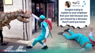 Viral video: People fall, run as a 'T Rex' charges at them in this prank |  Trending News,The Indian Express
