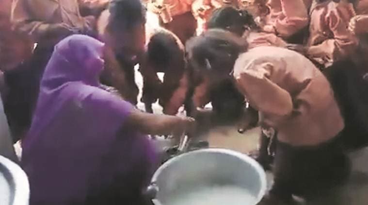diluted milk mid day meal, milk with water given to students, sonbhadra school milk with water, uttar pradesh mid day meal programmes, indian express news