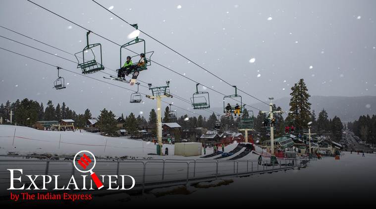 In this photo provided by Big Bear Mountain Resort, snowboard and ski enthusiasts ride a lift to the slopes at Big Bear Mountain Resort in Big Bear, Calif., Monday, Dec. 23, 2019. Winter weather advisories are in effect for the interior mountains of Los Angeles and Ventura counties, where a foot more of snow is expected at elevations above 7,000 feet and lesser amounts down to 5,000 feet. (Jared Meyer/Big Bear Mountain Resort via AP)