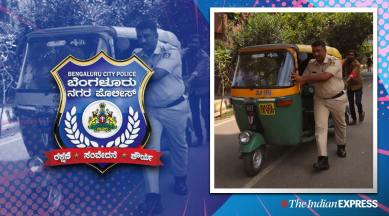 Bengaluru police cop helps auto driver viral photo, Karnataka cop viral pic, cop helps auto driver, trending, indian express, indian express news