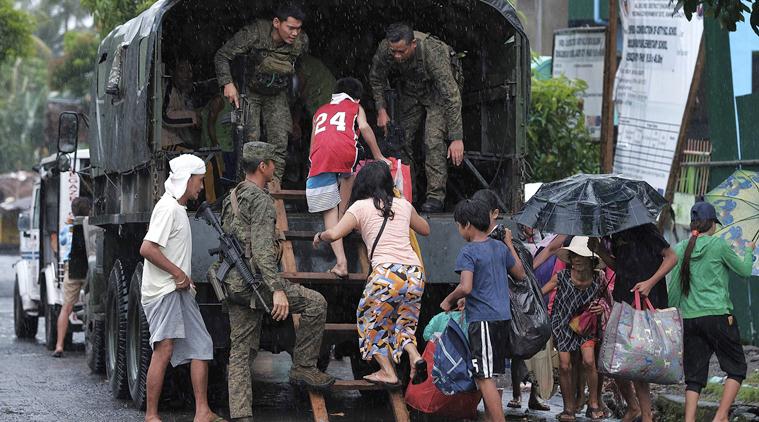 One Killed As Typhoon Hits Philippines, Hundreds Of Flights Halted ...